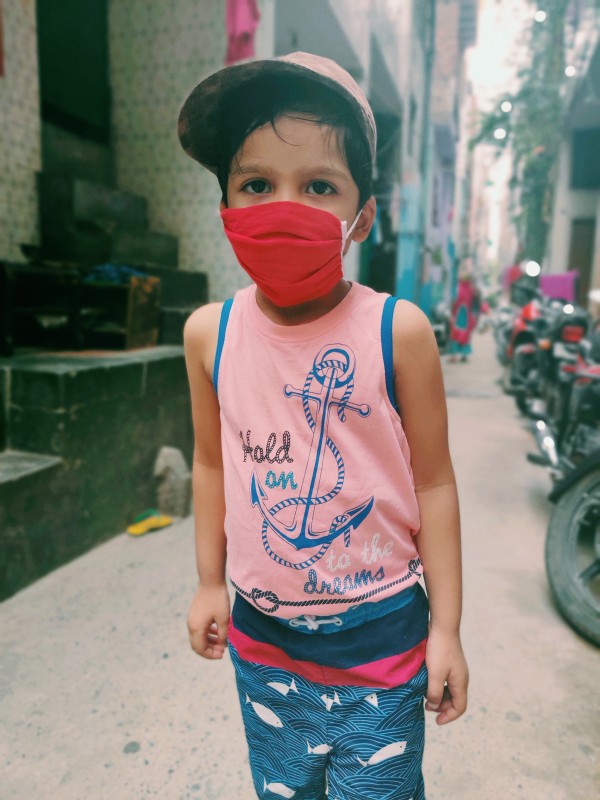 Kid Wearing Red mask
